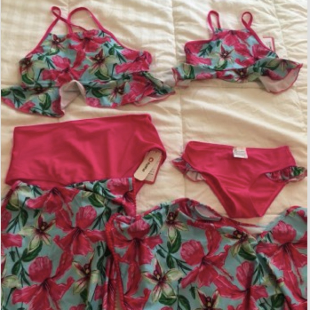 Matching mother daughter bathing suits and coverup
